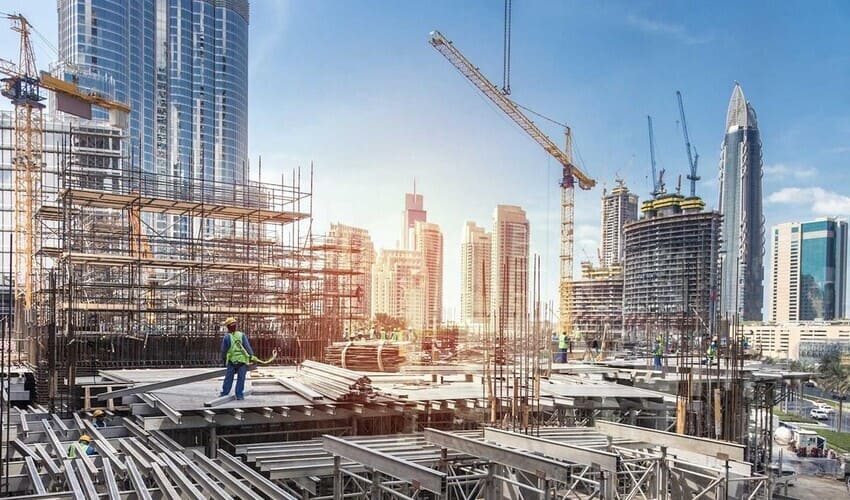 Off-plan construction site in Dubai showing cranes and unfinished structures symbolizing smart investment before completion.